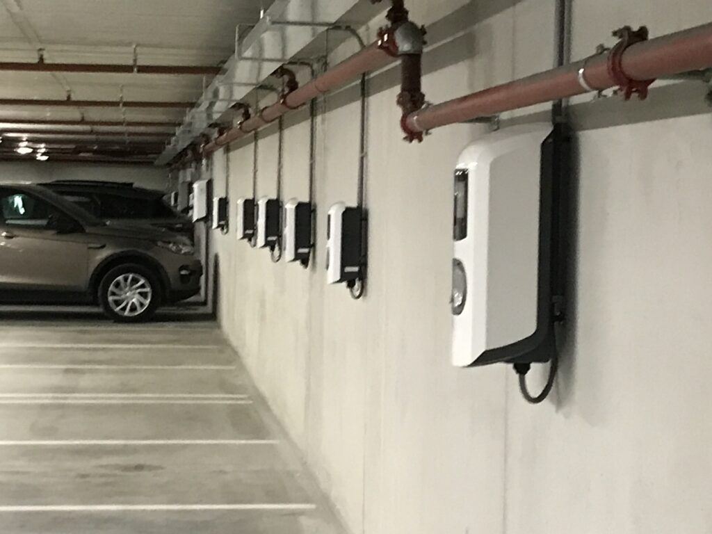 Electric vehicle chargers in parking garage
